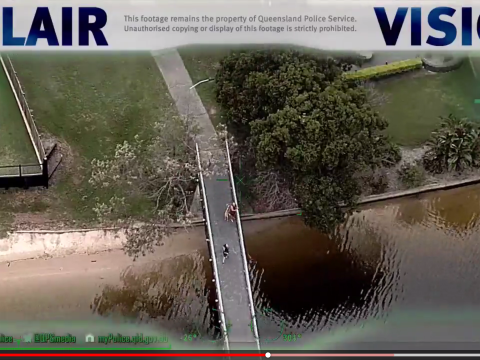 逃走する犯人の逮捕に協力する市民